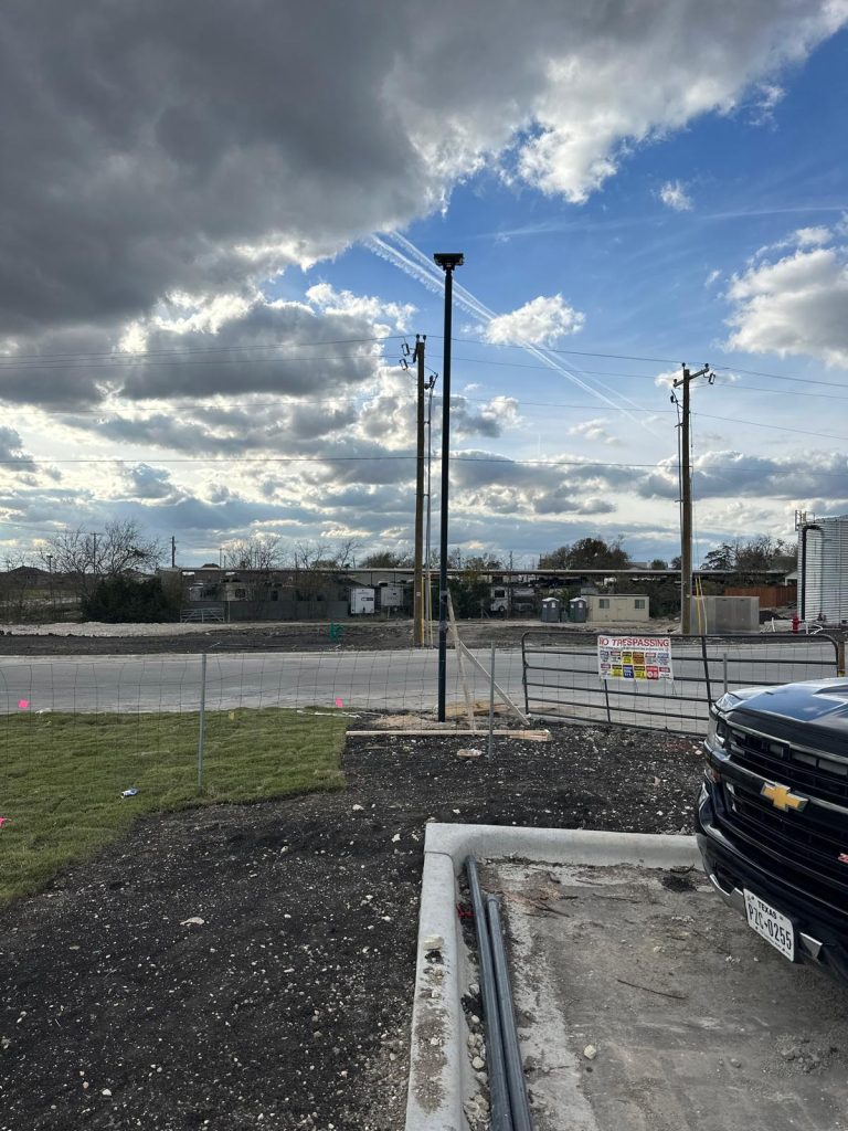 Construction site with temporary solar street light pole