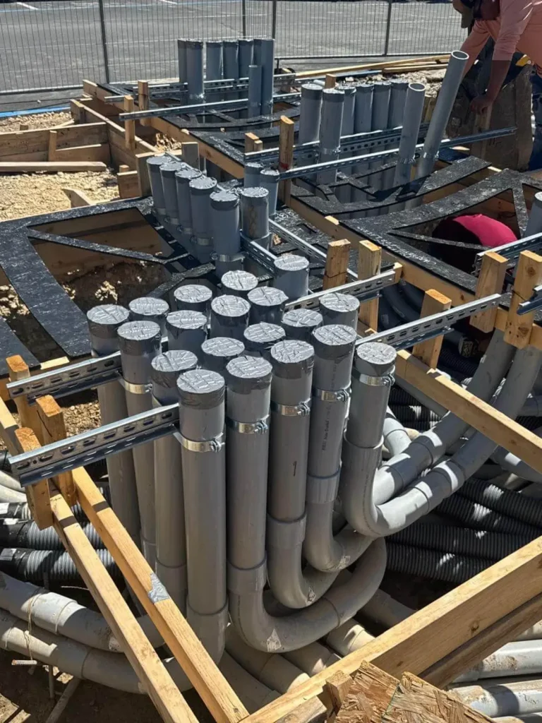 multiple underground utility conduits installed for commercial electrical and infrastructure systems